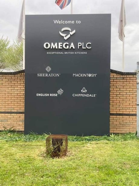 Omega PLC sign
