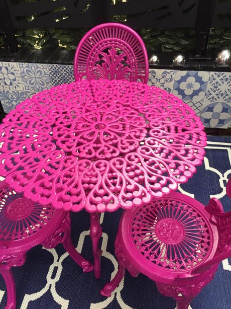 Pink garden table and chairs close up